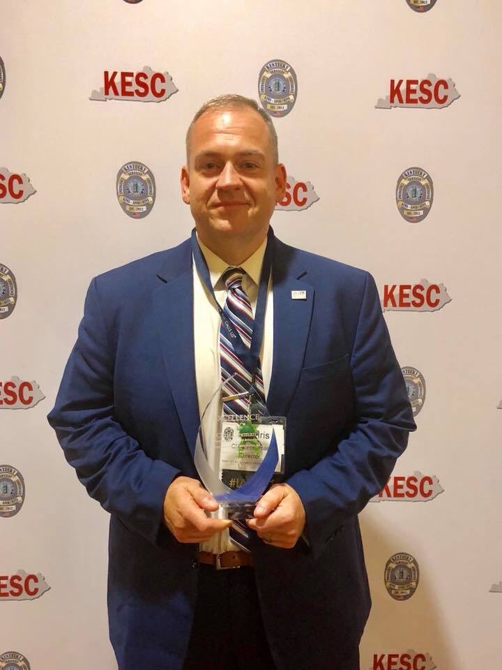 We are so proud to share that Thursday evening at the 2018 Kentucky Emergency Services Conference in Louisville, KY, Barren-Metcalfe Emergency Communications Center Director Chris Freeman was named the 2018 APCO Director of the Year.

#bmecc #kesc #apco #directoroftheyear