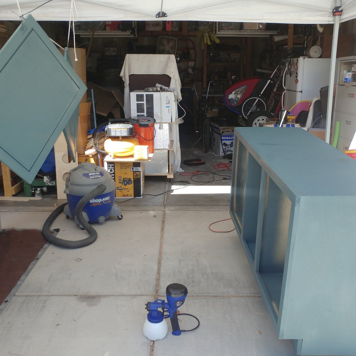GoaldenServices's tweet photo. Got the initial coat of paint on the bar project! Love the color (@BehrPro Underwater) and think it's really going to pop with the #walnut top! SOO impressed with the @HomeRight #finishmaxsuper sprayer but they know this already!! #handyman #furnituredesign #smallbusiness https://t.co/GeUXi3WYuR