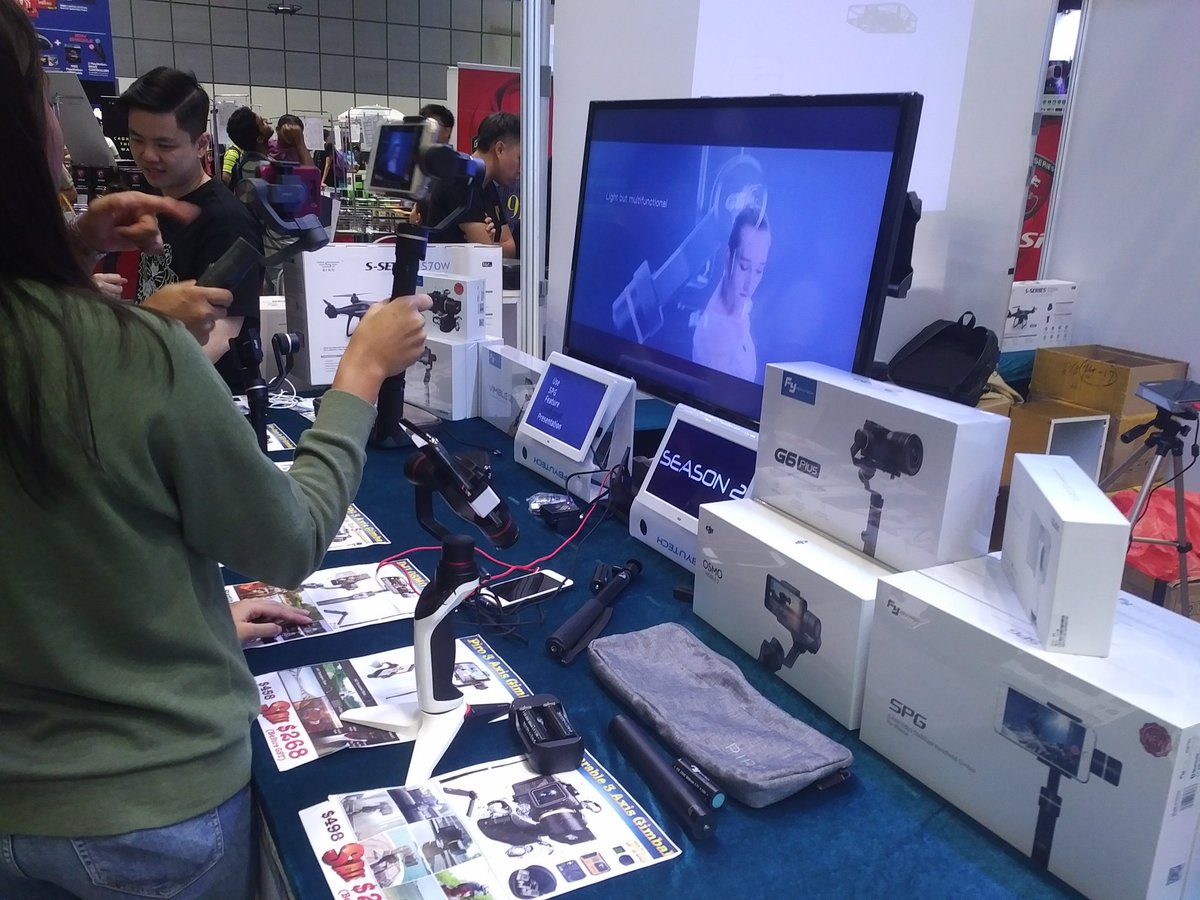 Gyrowoof's tweet photo. Camera active gimbal and drones are rather hot in the Comex show this year. You even get kids flying drones inside the show. Lol. #Computers #Comex2018 #comex #Singapore https://t.co/GzoHtV6Rbs