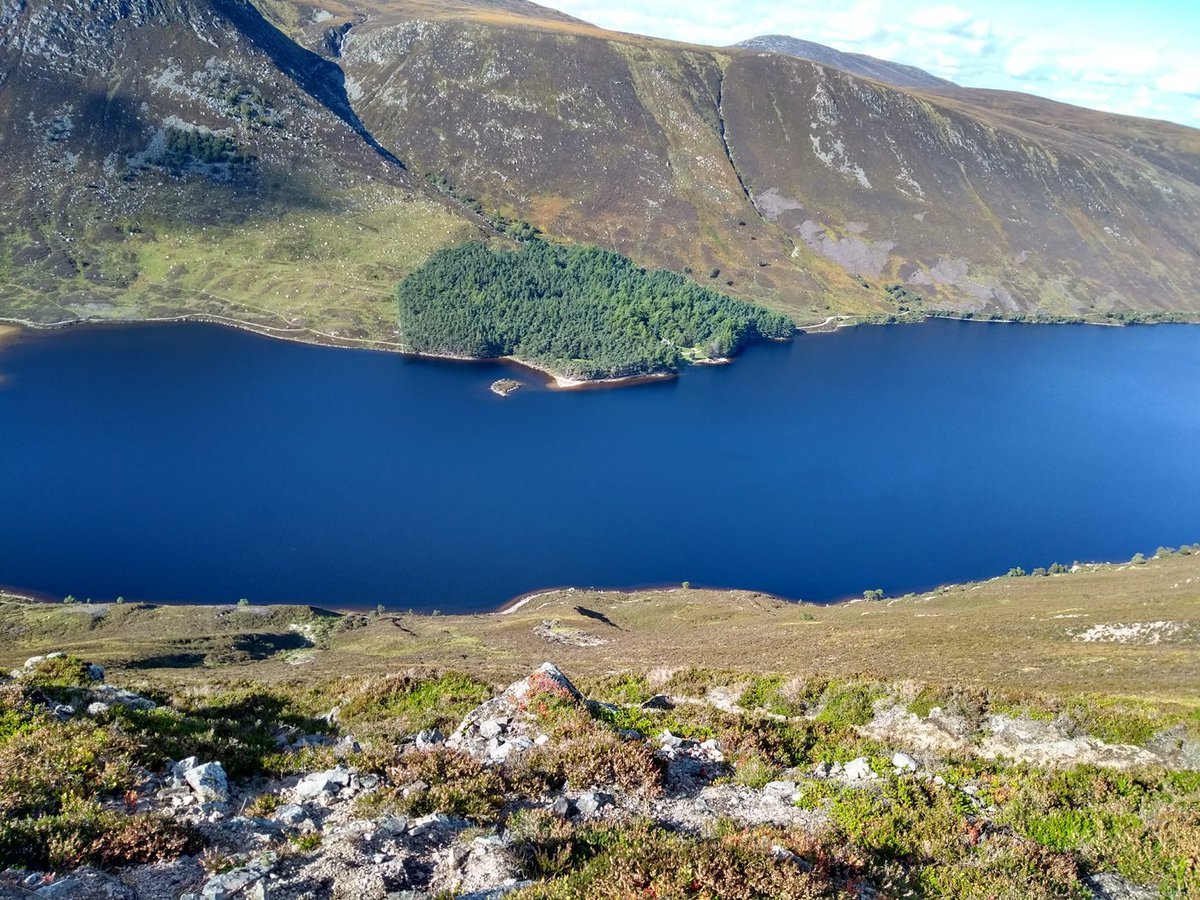 Eyrieman's tweet photo. #LochMuick looking beautiful yesterday on the return leg of the Capel Mounth - Glen Muick to #GlenClova - via #BroadCairn. Another fabulous day in the #CairngormsNationalPark https://t.co/t0zfXBlX77