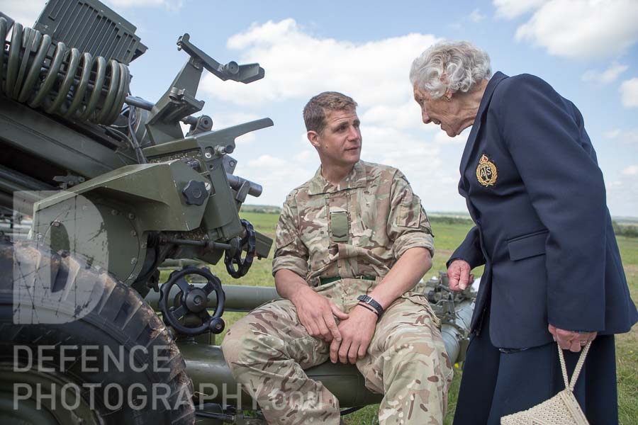 DefencePhoto's tweet photo. Been there, done that - ATS gunner from #WW2 meeting today's gunners at #RA300. Today is #ATS80th - happy birthday ladies. @ArtilleryRoyal @WRACAssociation https://t.co/FE3EAKau8s