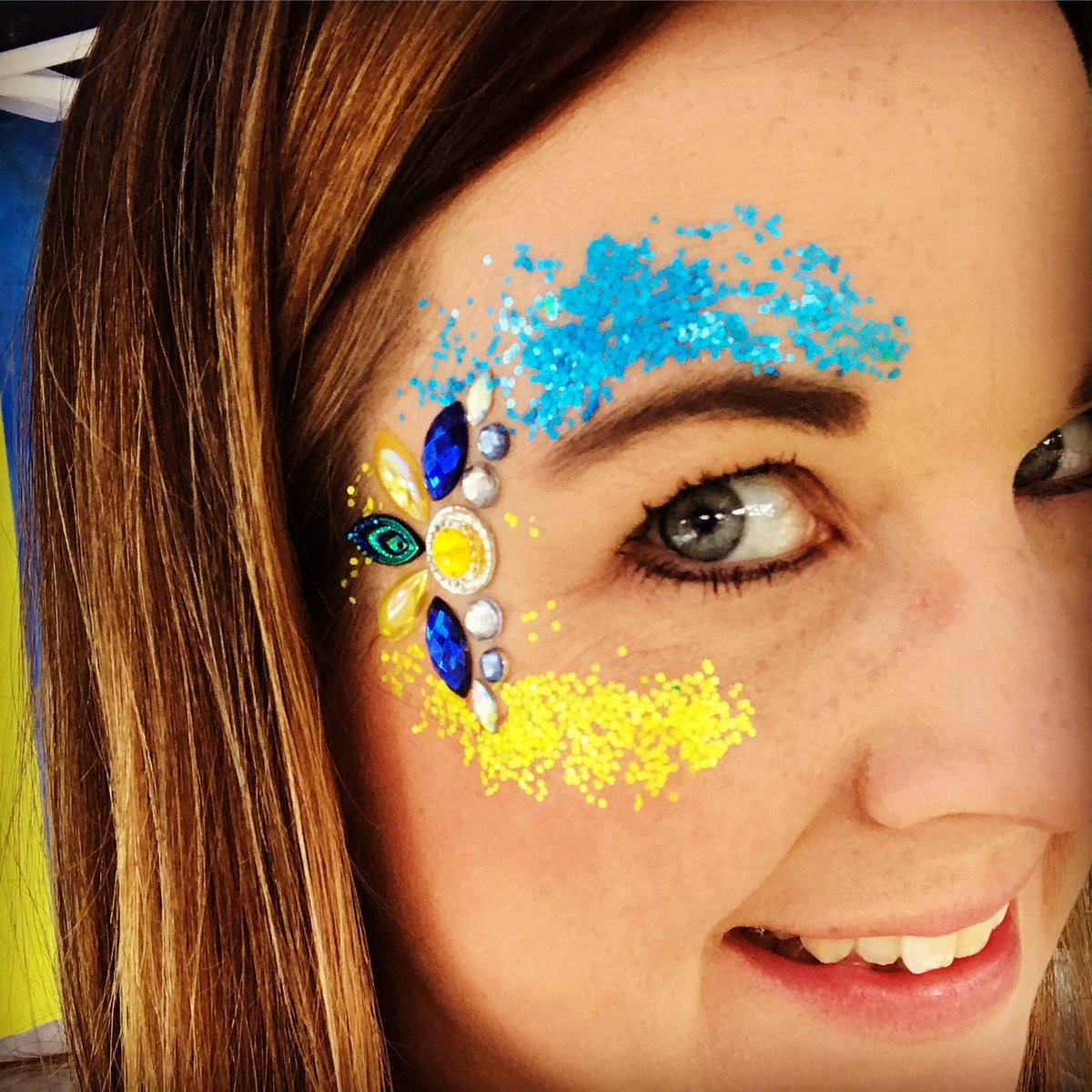 All ready in my blue and yellow for the #spiritofukraine 2018! @FortyHallPark #spiritofukrainefestival #spiritofukraine2018 #ukraine Such a lovely event #facepaint #facepainter #facepainting #facejewels #facegems #festivalglitter #festivaleyes #festivalmakeup #glittereyes