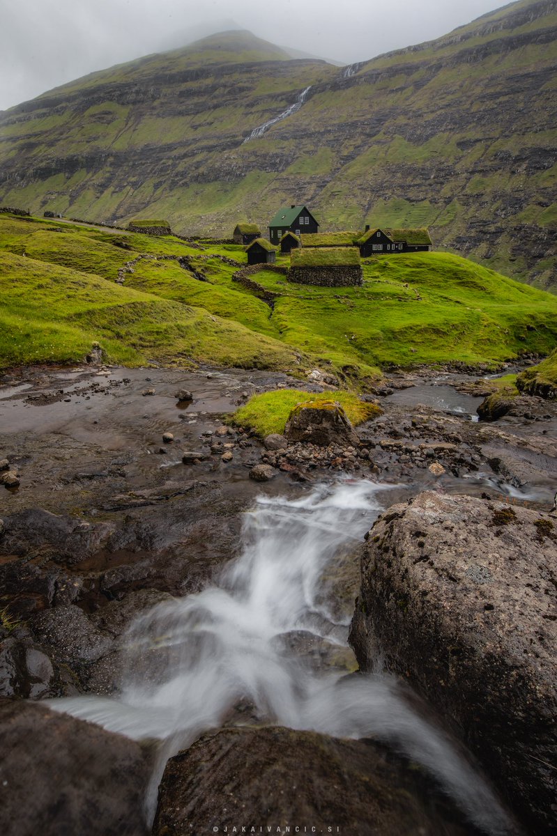 jaka_ivancic's tweet photo. The Faroe Islands are full of waterfalls. Everywhere you go, eveywhere you walk or drive you can see one. This one is just above the Saksun village, with his typical tarf roof houses. #waterfall #turfroof #sodroof #streymoy #saksun #eysturoy #faroeislands https://t.co/NjXaDPPmIM