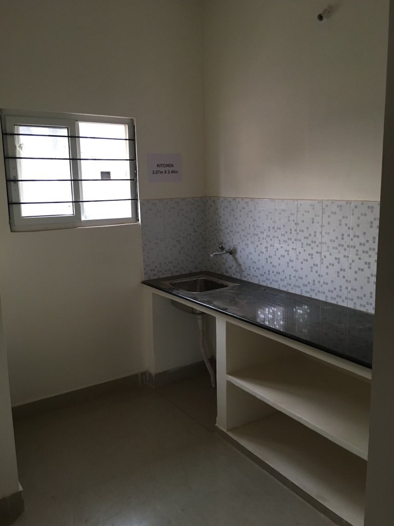 Check out the interiors. Nothing less than a flat we normally buy. In fact, the quality is superior to the brick/blocks construction. Shelves, vitrified tiles, granite top kitchen....