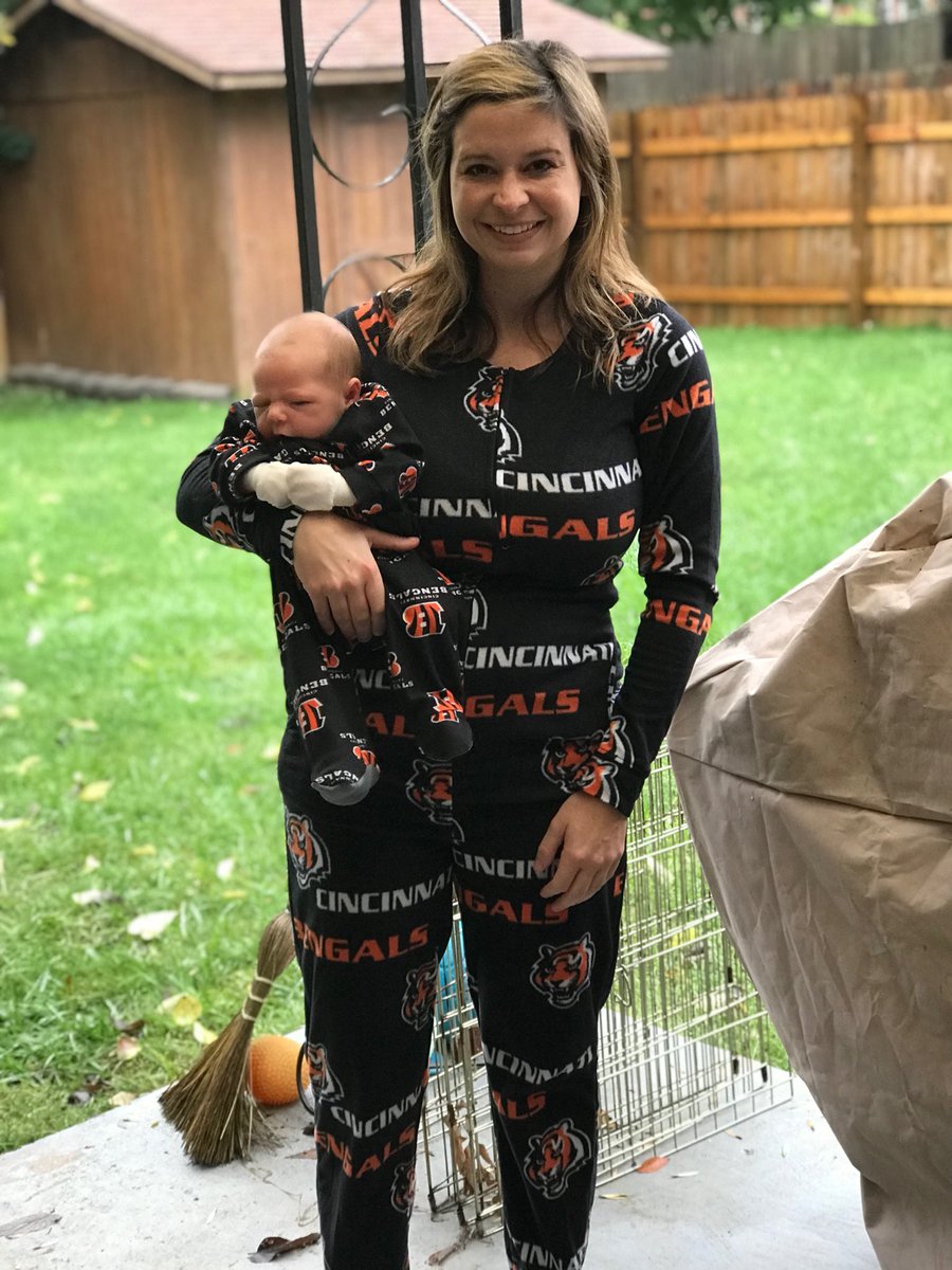 AlexTobey's tweet photo. Beckett got to witness a @Bengals win for his first game! And We wore matching onesies 😍 #whodey #3weeksold #bengals https://t.co/UrLEBFKi2I