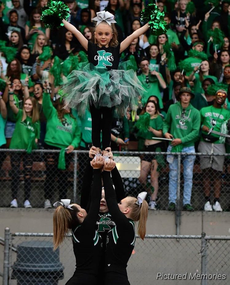 KDubCheer's tweet photo. So much fun Last Friday at the football game! Hope to see all of you next Friday at our home game against Kentlake!! 💚🖤🏈 #MascotGoals #BeAConk #DynastyContinues https://t.co/qOpGvBlGmA