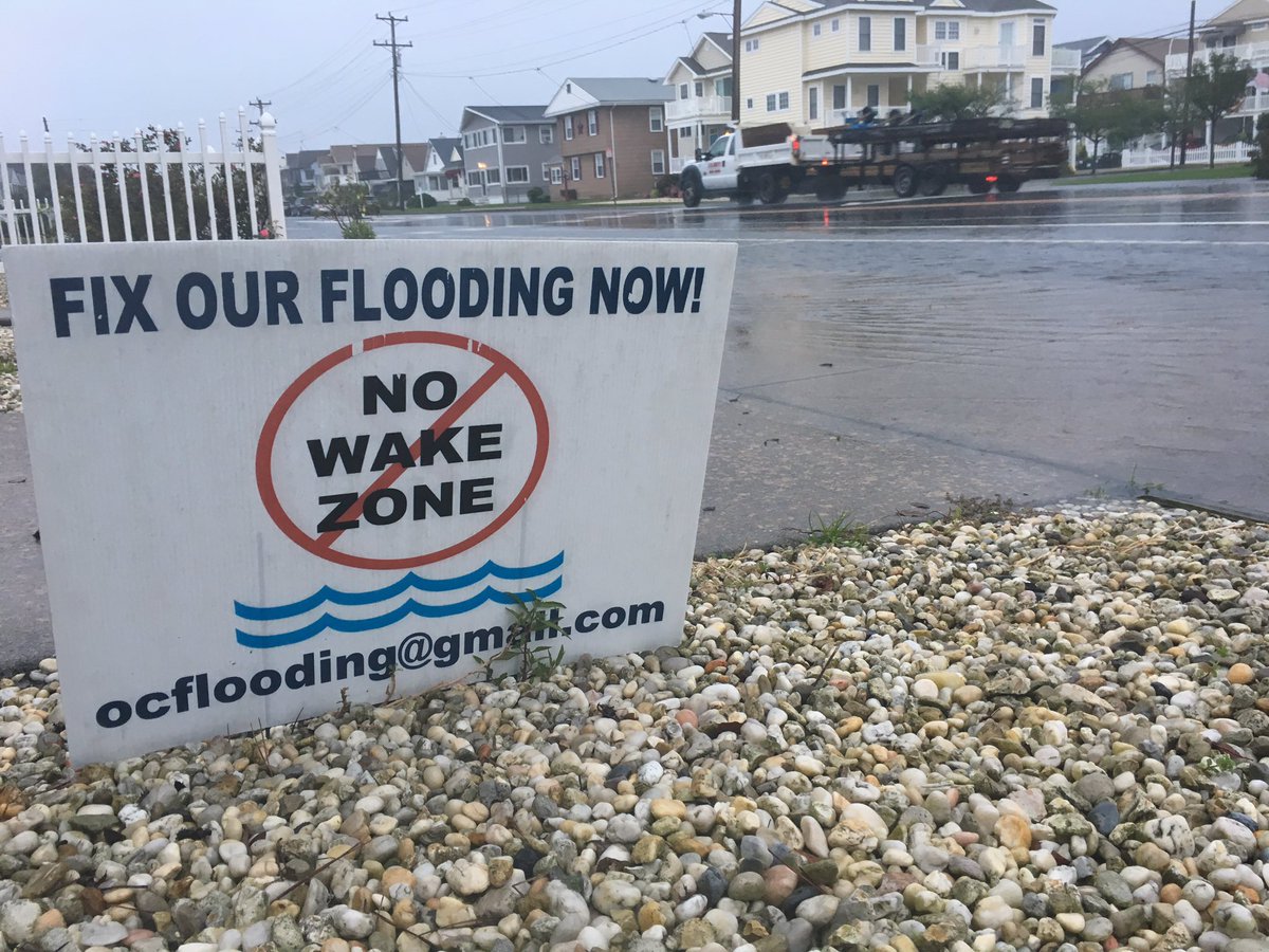 JenniJoyceTV's tweet photo. OCNJ: Fix our flooding now! A sign posted on West Ave near 25th street where flooding is once again a problem today.... #tsgordon #florence is next... @FOX29philly https://t.co/C6QYjnnvqa