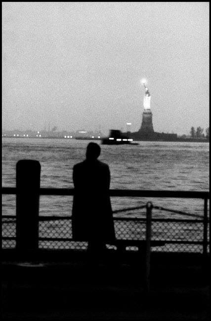 USA. New York City. 1950’s. View of Statue of Liberty from Battery Park. Elliot Erwitt