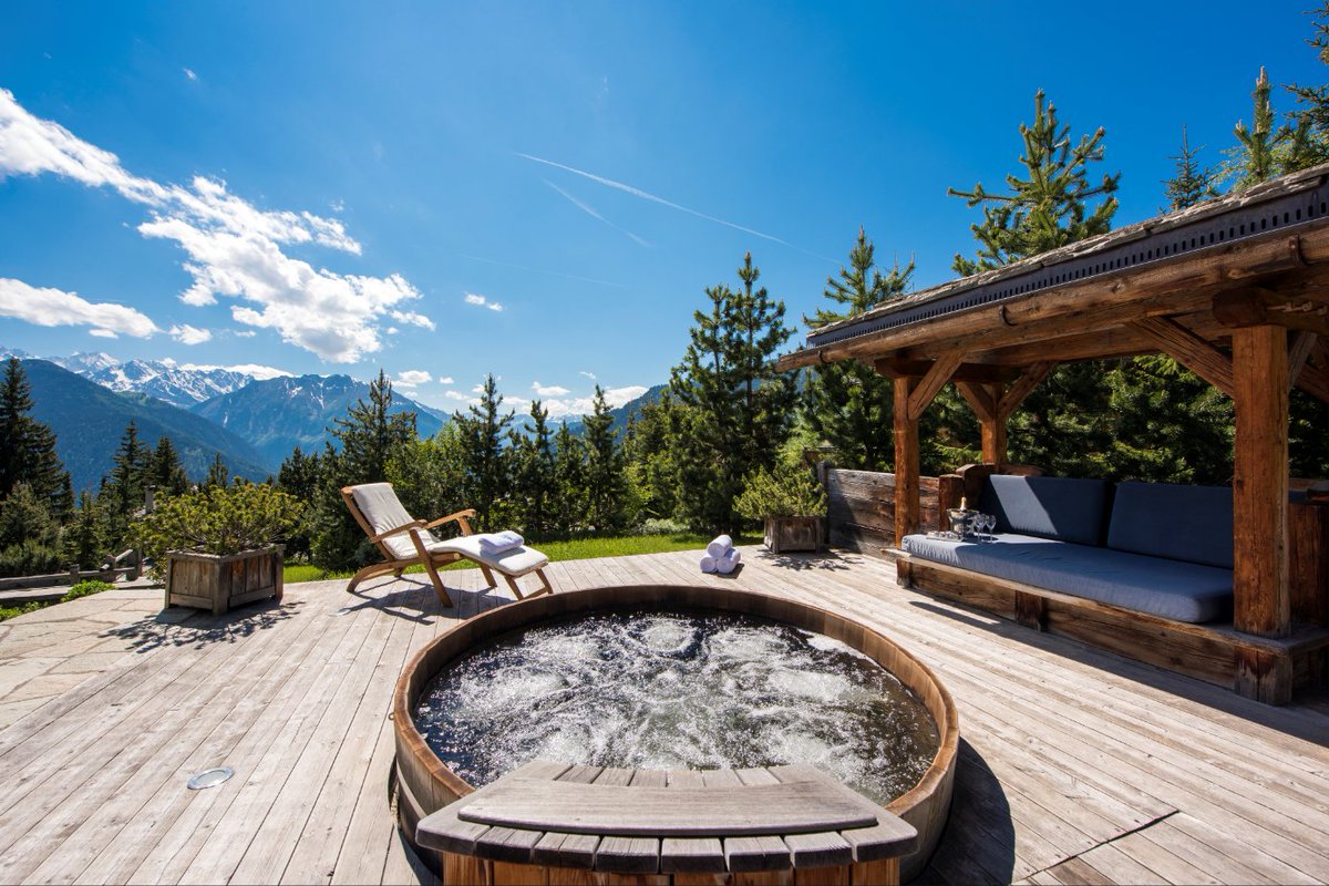 After a fun filled day in the Alps, come back to your #luxury alpine chalet where you can indulge, #relax and re-energise in the outdoor #jacuzzi, with a glass of champagne looking out over the mountains 

#NationalSpaWeek #HotTub #OutdoorSpa #Mountains #TheAlps #SummerInTheAlps