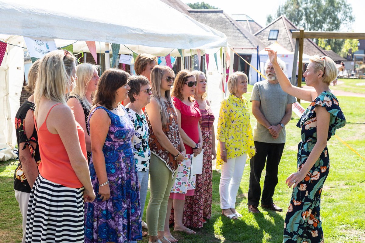 The wonderful parents choir <a href="/SSChospices/">Shooting Star Children's Hospices</a>  singing ‘happy together’ at the summer fete ❤️