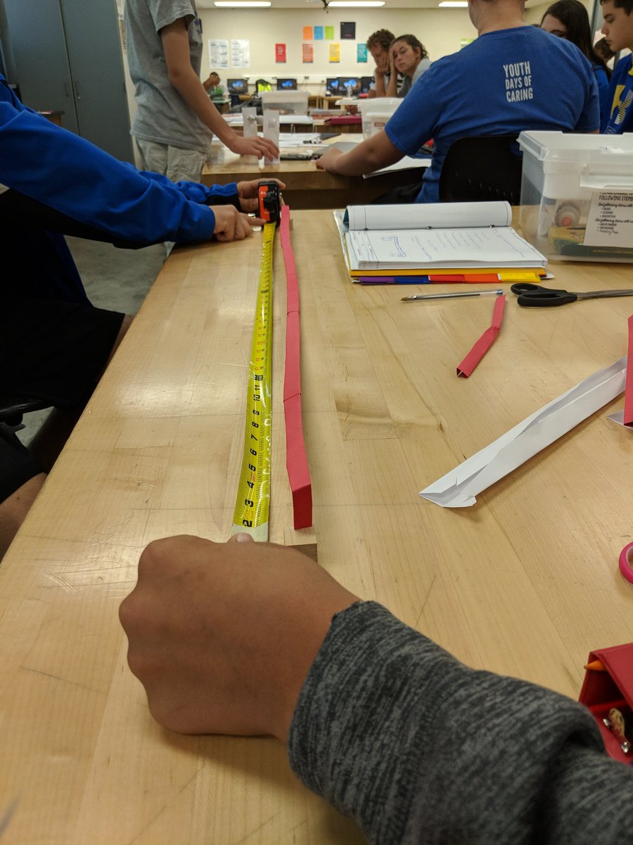 PLTWorg Intro to Engineering Design Ss applied the Design Process to create  the longest paper bridge with one sheet of cardstock. New record set: 42 in  long! #265Pride @USD265_PLTW @USD265_GHS @cbanka, image size:900x1200