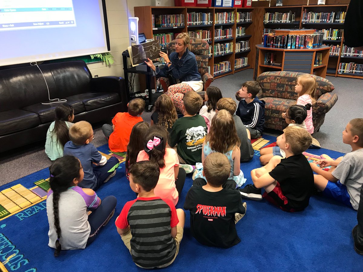 MrsB_KME's tweet photo. While listening to a picture book about Ivan, this kiddo is announced as today’s Ivan raffle winner! Way to go! Let’s keep reading! #kanelandprideOSOB https://t.co/n0FJDmGuOU