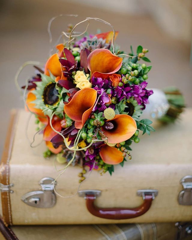 We absolutely love the autumn colours of this gorgeous bouquet. 
Photo by Karina Walker