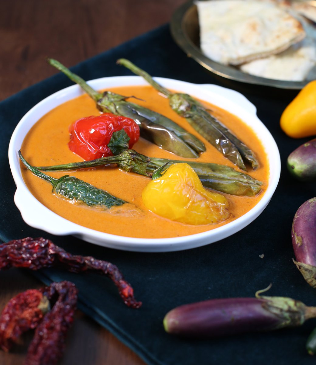 Try our rich yet light vegetarian curry with grilled eggplants and peppers! This Hyderabadi curry will leave you wanting more. Order it as an entree or part of a set lunch. #MeatlessMonday #Vegetarian #Vegan #Eggplant #EggplantCurry #VegetarianCurry #Baingan #BaiganMirchSalan