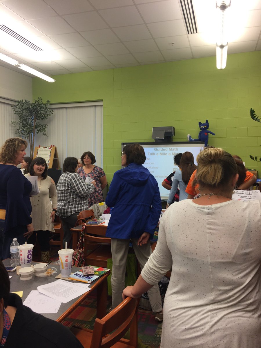 Gr2Stanley's tweet photo. Teachers participating in "Talk a Mile a Minute" at Guided Math training presented by Teacher Created Materials. #kcslearning2020 https://t.co/rzI2yGx0U8