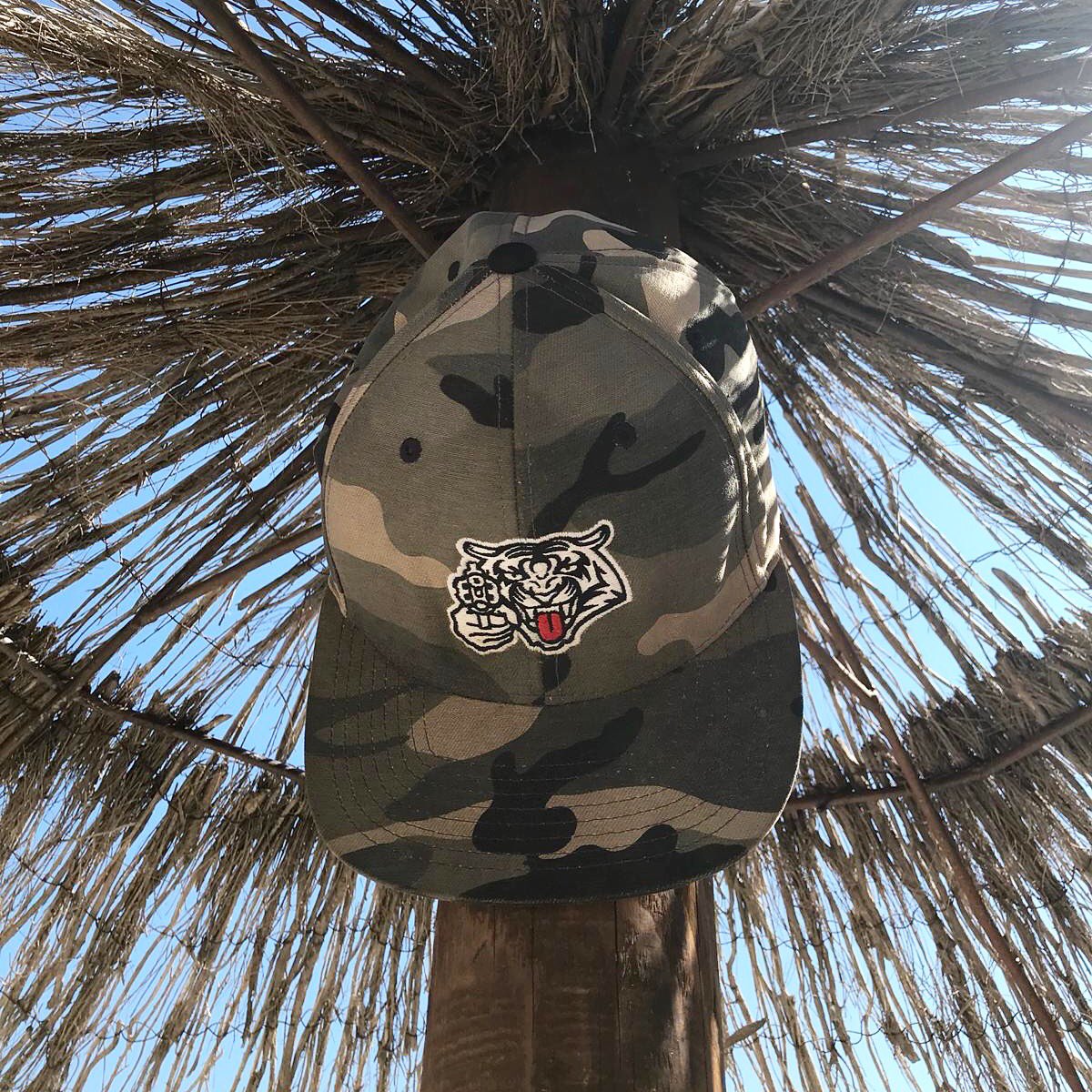 MOST_HUNTED's tweet photo. Shot by shot, item by item we are saving wildlife. Hope you had a roarsome time Robert and Laska 🙏🏼😻 #islandlife #corfu #greece #mosthunted #tigercap #camocap #snapbackcap #tigerdesign #embrodery #shootback #savewildlife #endextinction #streetwear #streetwearwithapurpose #roar https://t.co/E4Nvi9iFqR