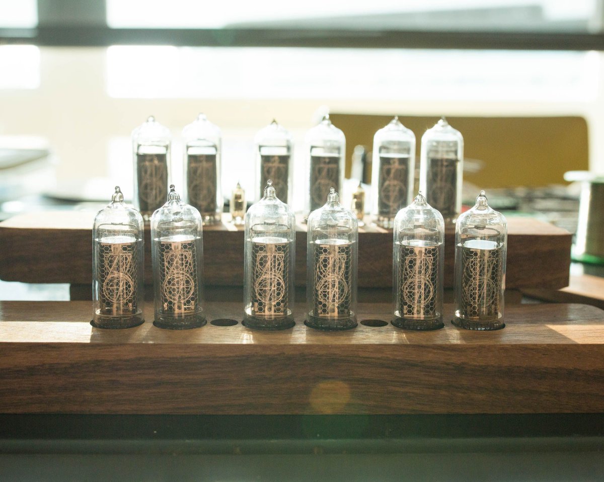 Two Luminous Rex Nixie tube clocks in a row.  You can see the anode mesh and digits behind it for each tube. 

#nixietube #nixieclock #tubeclock #diyclock #clockdesign #vacuumtube