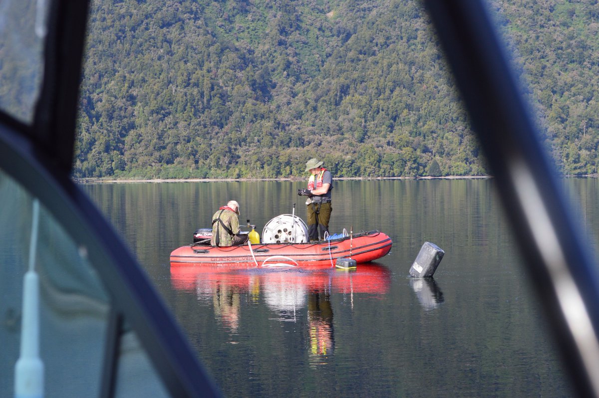 MountainGeomorp's tweet photo. Retrieval of cores from Lakes Paringa and Mapourika, Southern Alps, NZ. 
Jamie Howarth and Sean Fitzsimons aboard. The aim: to quantify the impact of earthquakes on carbon export in active mountain belts. NERC-funded project, led by Bob Hilton from Durham University. https://t.co/A9DPv62NHX