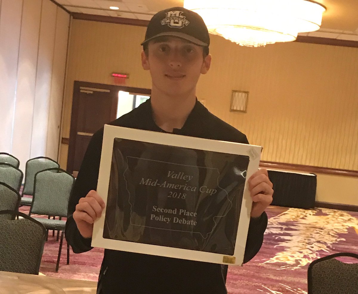 muhsdebate's tweet photo. After narrowly losing their bid round at Niles, Joe (pictured) and Bernard (taking picture) copped their first TOC bid of the year at Valley on their way to Finals where they lost to an excellent @WaRuDebate team! Bernard also earned 7th speaker--awesome tourney! #HilltopTop2 #TM https://t.co/Ib5nQasTrN