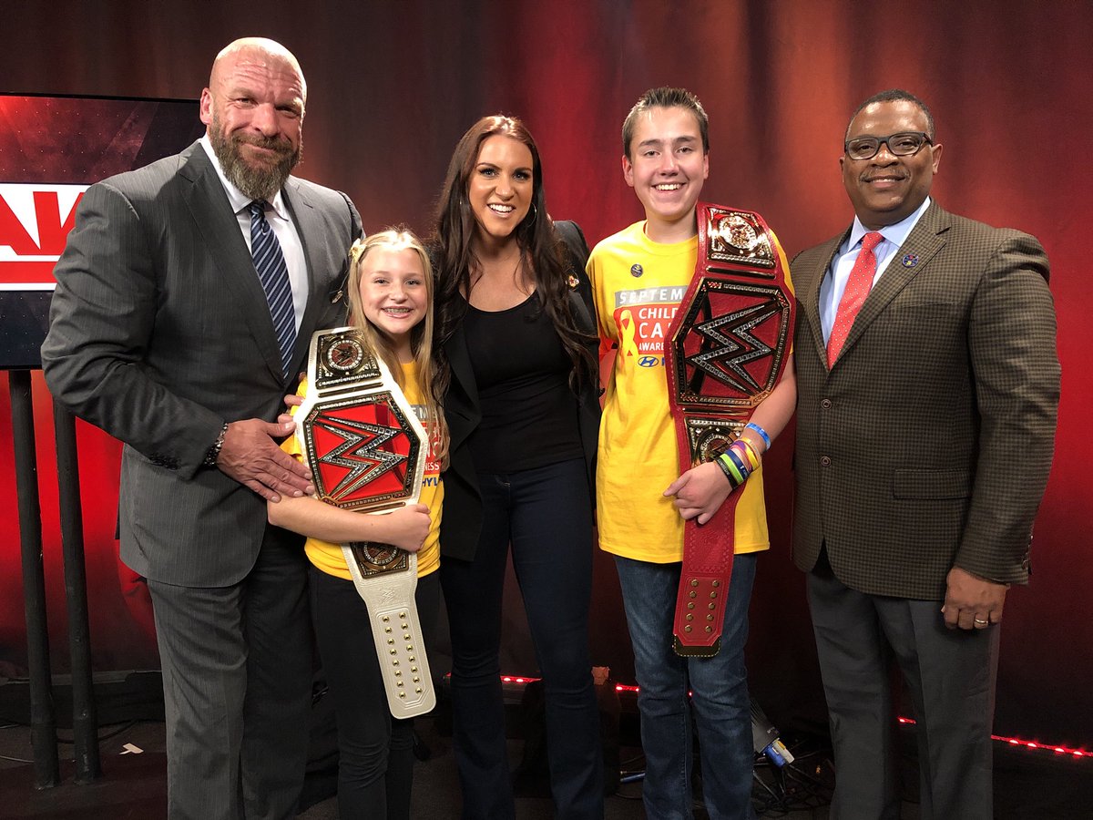 TripleH's tweet photo. To our newest Champions Elizabeth and Carter, our partners @Hyundai, all of our Superstars of Tomorrow and the entire @WWE Universe supporting #ConnorsCure: THANK YOU for helping us continue the fight against pediatric cancer. https://t.co/tcZLX1ZsX7