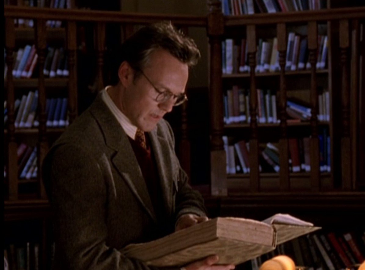 here we have Giles in a frankly sensational crimson sweater vest paging through the Malleus Maleficarum, a screencap I have taken for no reason,