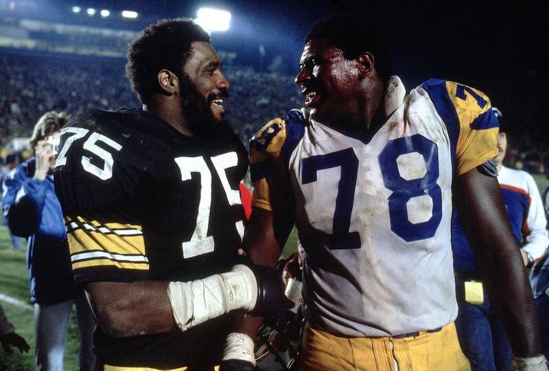 Mean Joe Greene and Jackie Slater after Super Bowl XIV
Happy Birthday Greene!  