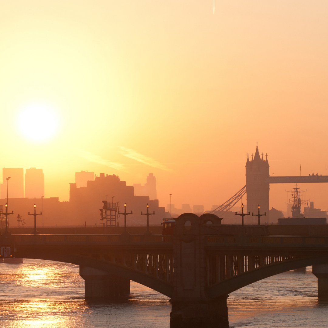 It may be a little colder today but the #sunrise over London was so beautiful over all the buildings!