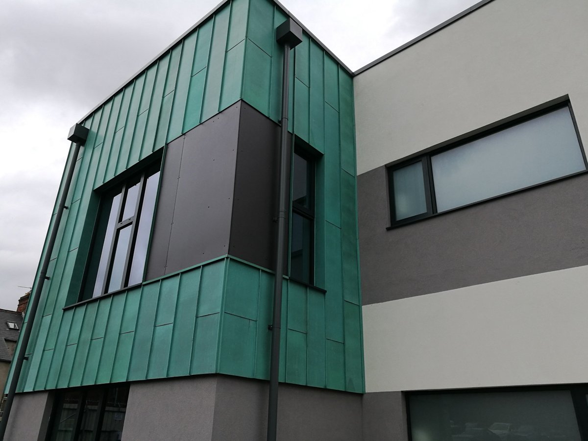 Metseam's tweet photo. Some snaps of the KME Pre-Patinated Copper cladding, at Colby House, Belfast. The copper was supplied by ourselves, and fitted by N&amp;D Roofing. @Metseam  #Copper, #prepatinatedcopper, #coppercladding, #copperfacades, #metalcladding, https://t.co/1SyI401uI6