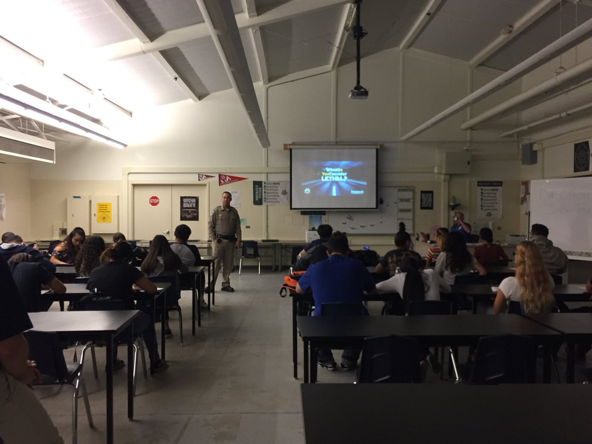 HooverIsReady's tweet photo. @HooverPates in the #PublicServicePathway are having a visit from @ChpFresno! Class of 2019 learning about distracted driving and the dangers! Thank you Officer Foraker! @CareerReadyGrad @CareerCenterHHS @fresnounified https://t.co/YbC61uI36Z