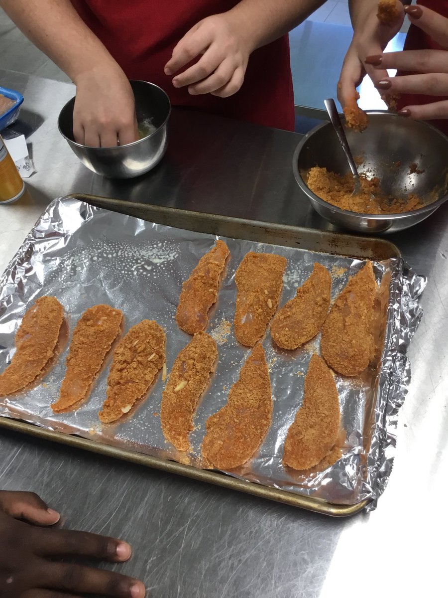 OakParkProstart's tweet photo. Students in ProStart 2 took a typical teen meal (chicken tenders & fries) and made a healthier, alternative version! #almondcrustedchicken #sweetpotatofries๐ #nutritionunit @Northmen_FACS @Northmen_Princ @ProStart https://t.co/A5YrR9Z1ik