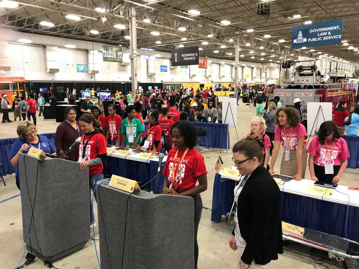 INSenateGOP's tweet image. We're having a great day at #JAJobSpark! Students are being introduced to the legislative process by participating in an interactive mock bill experience. At our Indiana General Assembly booth, two 8th graders debate on a bill, while other students vote on the bill!