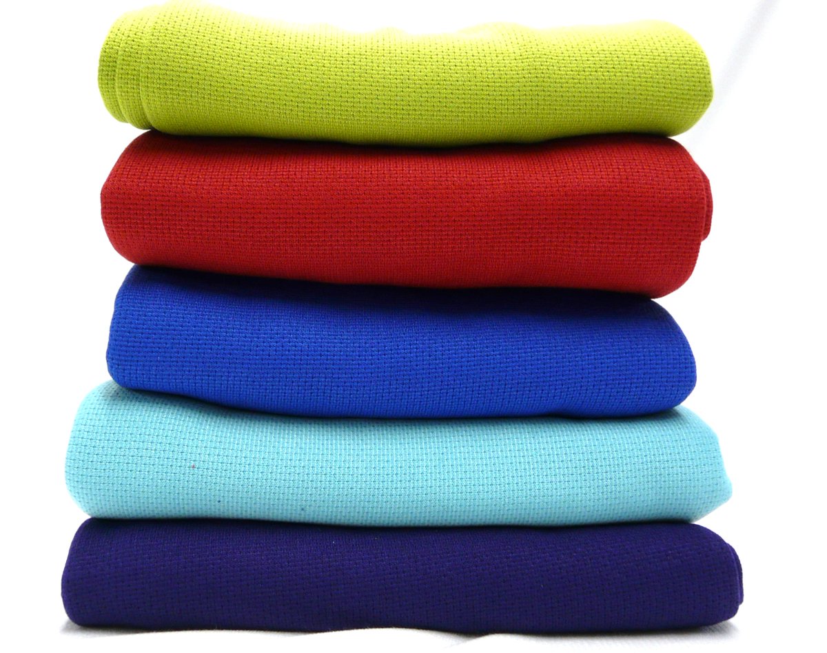 The start of the winter season means we receive lots of towel orders from swim teams.  Today we're cutting fabric for a run of royal blue and lime Ultra-Fast Dry Sport and Travel towels.  bit.ly/2NALrol