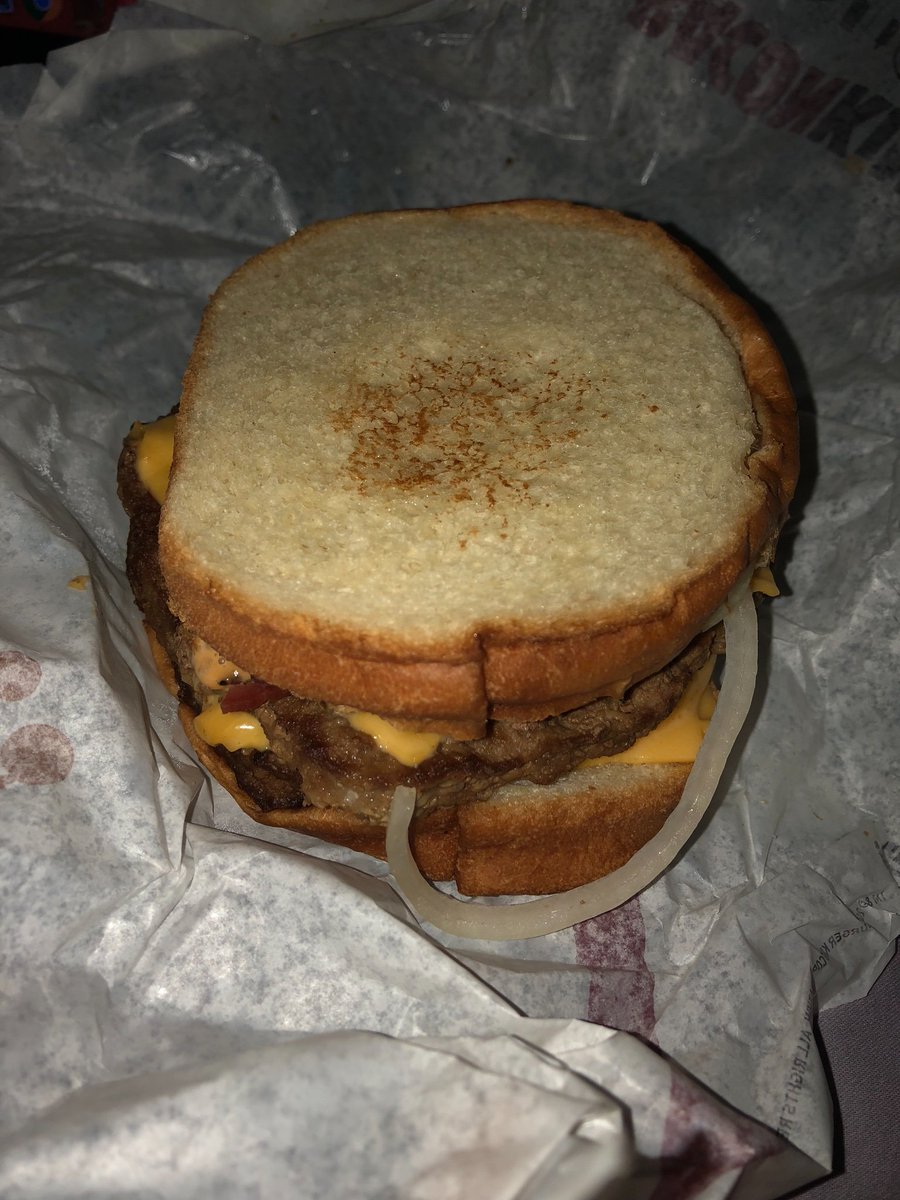 _lebarker_'s tweet photo. @BurgerKing  lol my “sourdough” sandwich, basically soppy bread now with a burger in the middle. Very gross and then the other side is the butt end of the bread.... 8$ wasted https://t.co/iWar6IUJI7