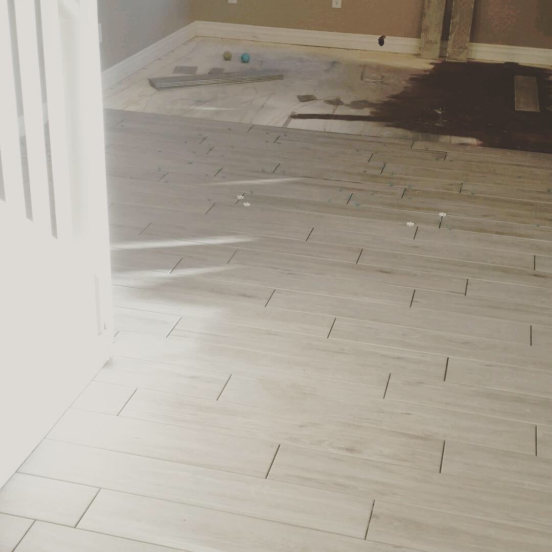 thefixitguyaz's tweet photo. Hey world! 🌎 did you miss us? We’ve been hard at work installing #tile flooring. #arizona #handyman #thefixitguy https://t.co/GjSgqhsAPV