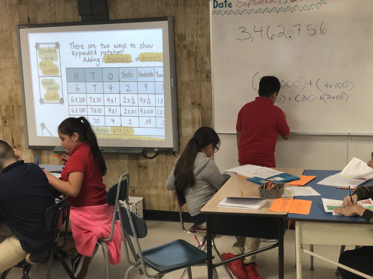 MsMathre's tweet photo. Expanded notation being taught by a wonderful student volunteer earlier today! Love it when the kids want to explain what they’ve learned to each other! #WeAreCornelius #HISDMathSpaces #WeAllLearnFromEachOther https://t.co/uoChsMc7eW