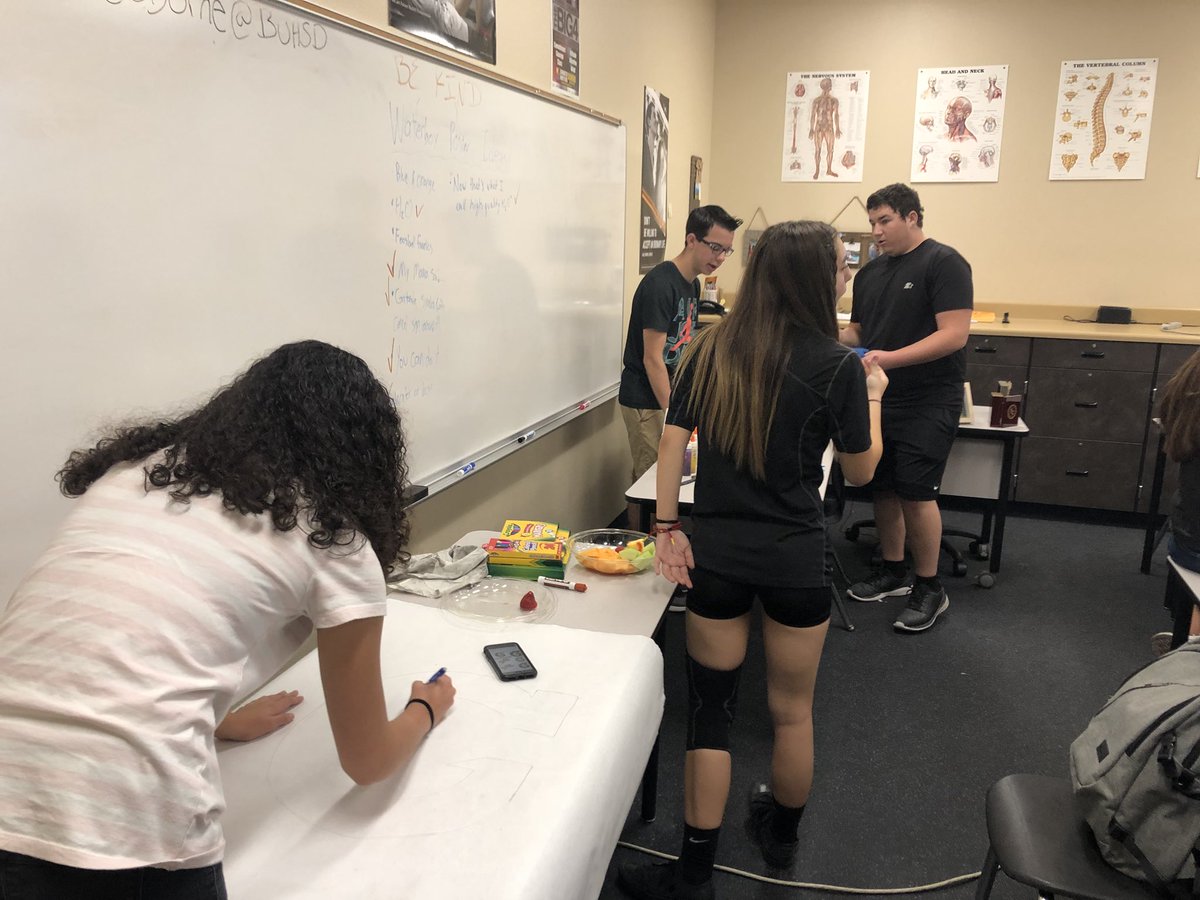 therealEFHSHOSA's tweet photo. HOSA members hard at work making posters for our parade float. Come check it out this Saturday! https://t.co/CtNMsoqp1e
