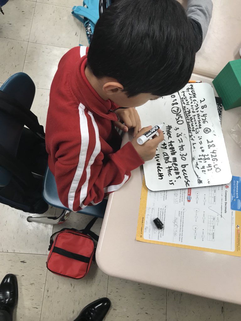 SuttonES_HISD's tweet image. Writing out your justification in Mr. Ascensio’s math class. ✍️📊 #DoNow #WritingFocused #AimForGold 🏅