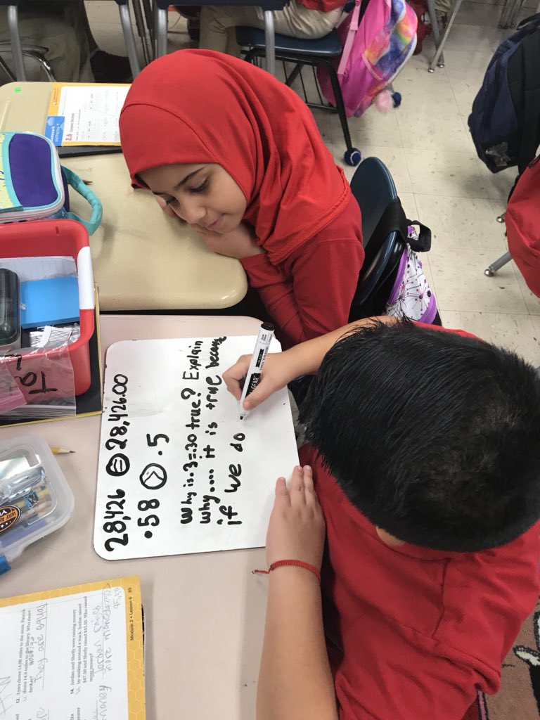 SuttonES_HISD's tweet image. Writing out your justification in Mr. Ascensio’s math class. ✍️📊 #DoNow #WritingFocused #AimForGold 🏅
