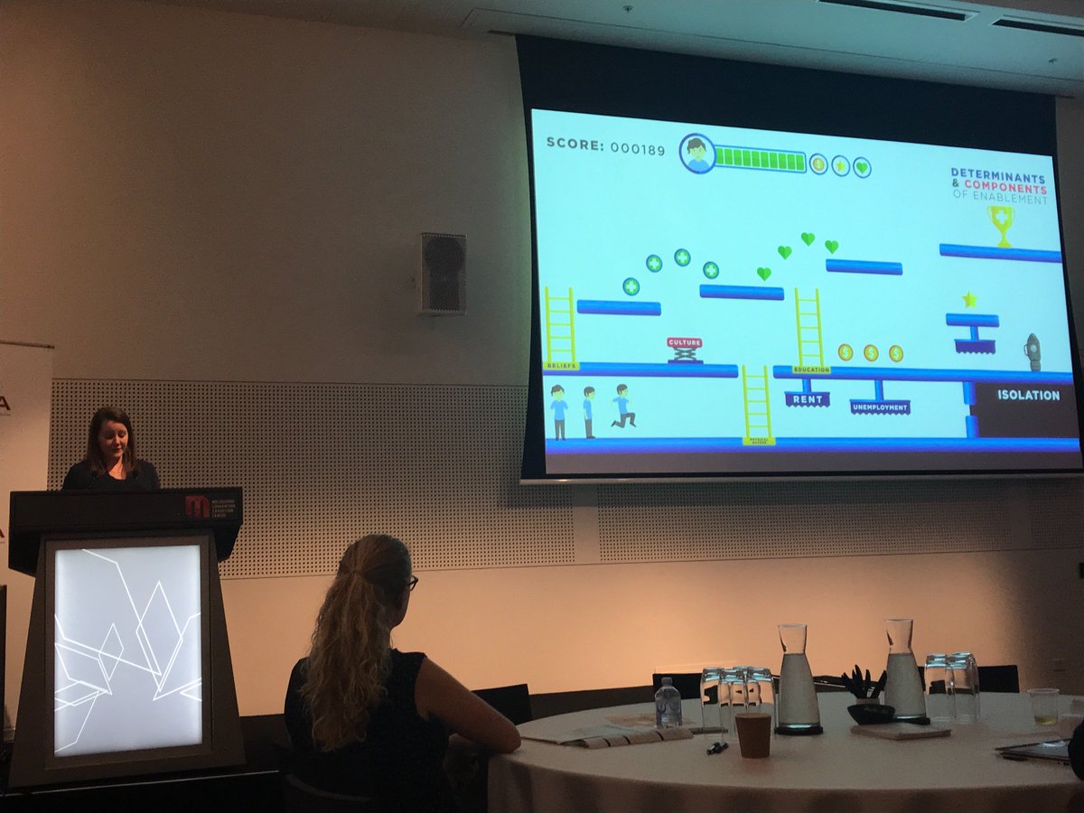 nic_cook3's tweet photo. .@JoGoodenough1 explaining the boosts and barriers of being an enabled consumer of the healthcare system at the #ADMA2018 National Conferences #consumerenablement #videogameoflife https://t.co/JrmFlpdgZ2