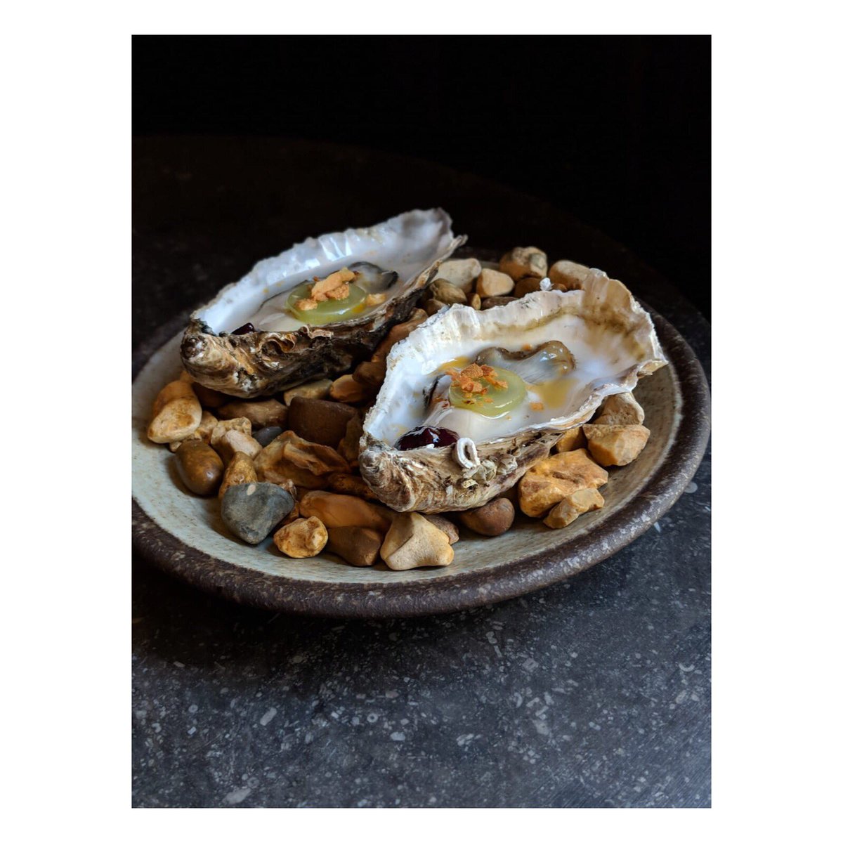 C O R N I S H •  O Y S T E R S
with pickled grape, chilli crisp, cherry &amp; white balsamic
.
#localproduce #cornishoysters #newmonthnewmenu #eattheseasons #mgpldn #heddonstreet #regentstreet #centrallondonrestaurant #london