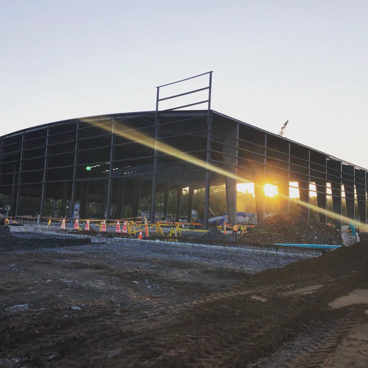 Construction starts early each day at the fieldhouse. Building erection nearly done and now we need to get the roof/walls up before winter hits.