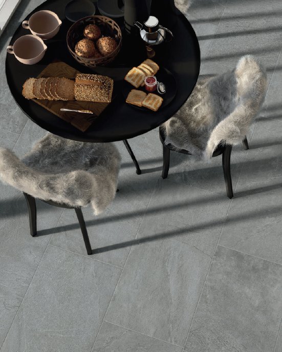 If you are not sure about using grey, then keep the tiles in one smaller area and be sure to use plenty of soft furnishings and warm tones for contrast. #interiordesign #interiorarchitecture