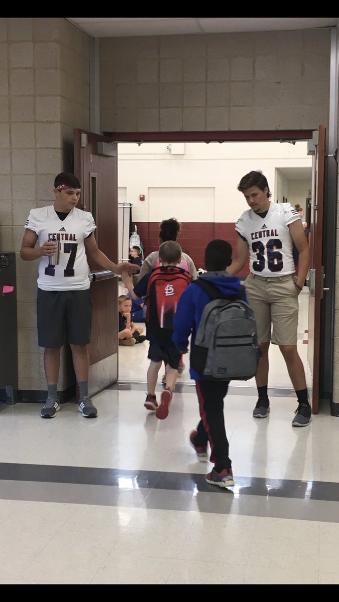 Rebel football players greeting students at West on homecoming Friday. #rebelsr3pride