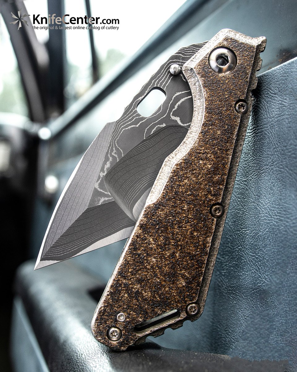 KnifeCenter's tweet photo. Hand ground by Mick himself, the custom XL SNG features his Nightmare Hollow Grind and hand stippled titanium scales. This one will cost you a pretty penny, but it's definitely worth every one.
https://t.co/jsWc4FSvPb 

#knifecenter #knife #knifecommunity #usngx #mickstrider #sng https://t.co/WpykQMqM9s