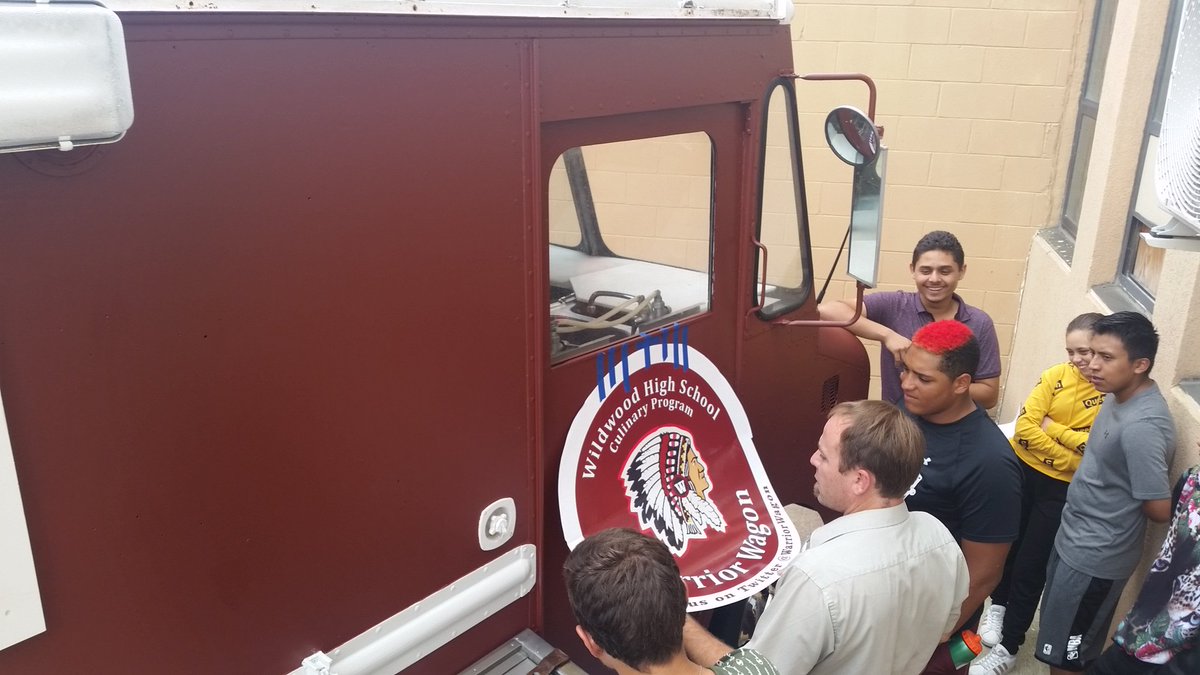 WarriorWagon's tweet photo. WHS Industrial Arts students getting The Warrior Wagon all dressed up for her maiden voyage! @WildwoodPSD @WarriorWagon #warriornation #FoodTrucks https://t.co/dv1UqRdjAZ