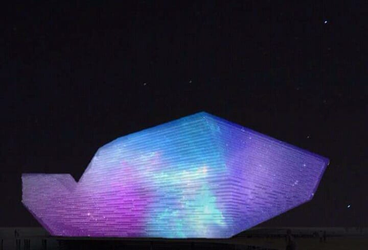 DundeeCulture's tweet photo. "Back in 2015, I had an idea of a light show being projected on to the V&amp;A when it was first going to open. From tonight, that wish will come true! 😀😂" #TheFutureWasPredicted #Dundee #DundeeCulture #3DFestival @VADundee https://t.co/o1tKcvAEnb