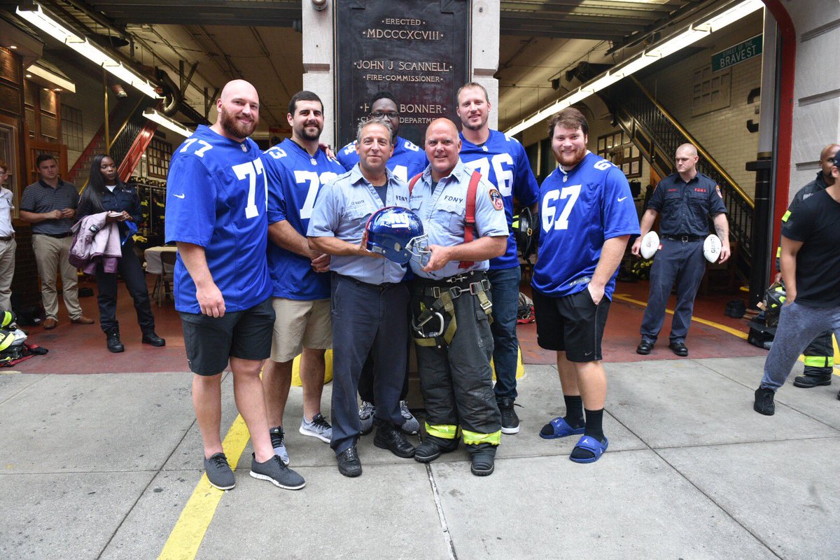 FDNY's tweet photo. #FDNY Battalion Chief Timothy McGuinness and Captain Michael Nasta were two of 91 FDNY Officers promoted today. Earlier this week, the @Giants visited their firehouse to honor all heroes lost on 9/11  #NeverForget https://t.co/cy2la91VNn