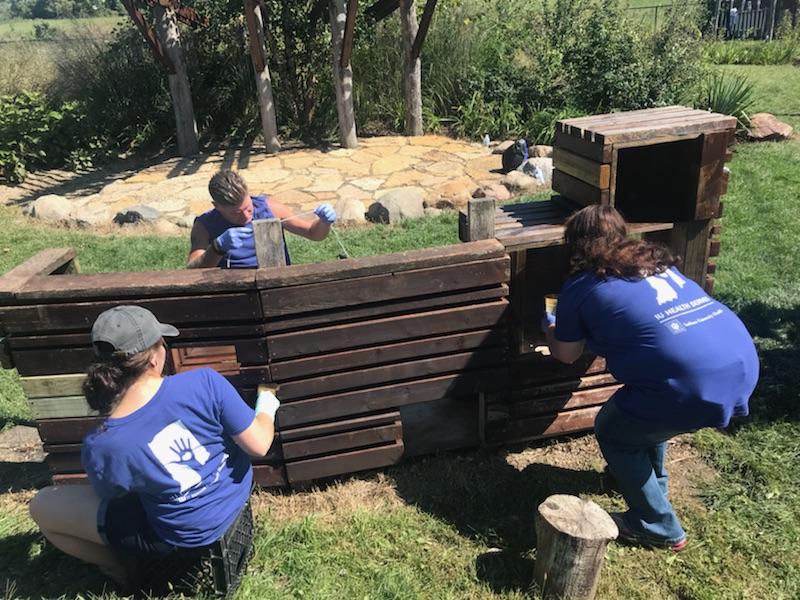 IUHealthECR's tweet image. Heather Rhodes has a team working at Head Start. They are working in the nature play ground mulching, staining and weeding. #DaysOfService