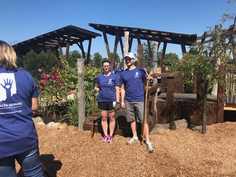 IUHealthECR's tweet image. Heather Rhodes has a team working at Head Start. They are working in the nature play ground mulching, staining and weeding. #DaysOfService