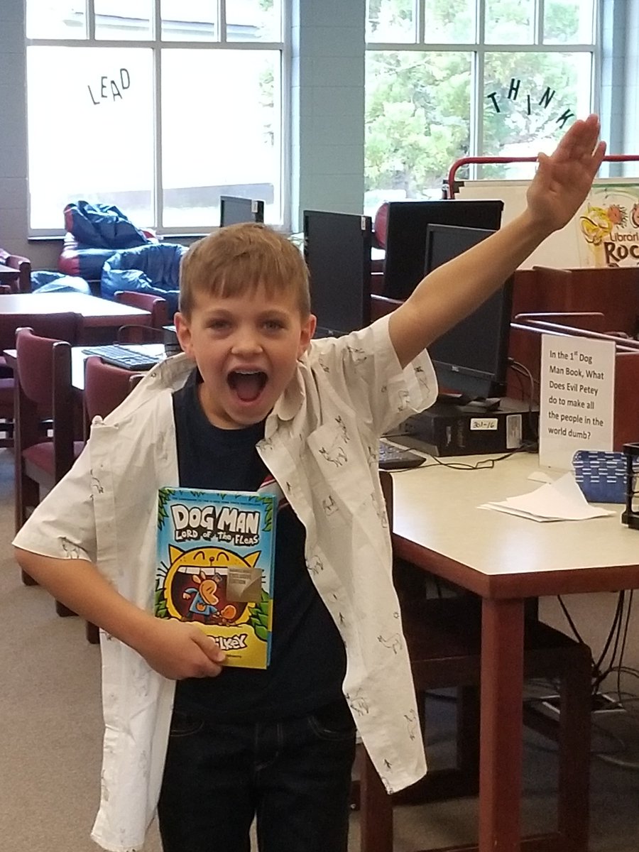 GoToddTigers's tweet photo. Our lucky winner for the Dog Man trivia contest gets his very own copy of the . book! Do you think he is excited? #lordofthefleas #dogman #d7libraries https://t.co/vXIDmp8Xxy